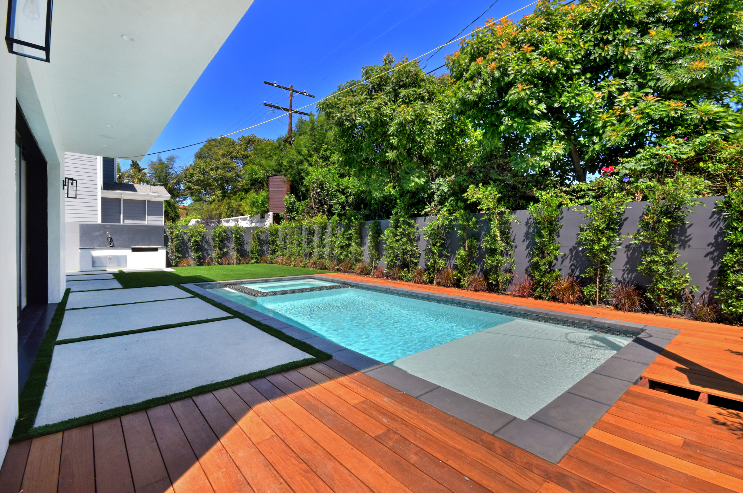 Custom pool with palm landscaping