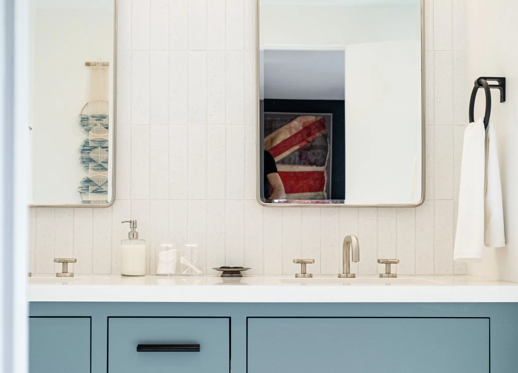 Bathroom remodel in Los Angeles with a blue double vanity and mirror detail