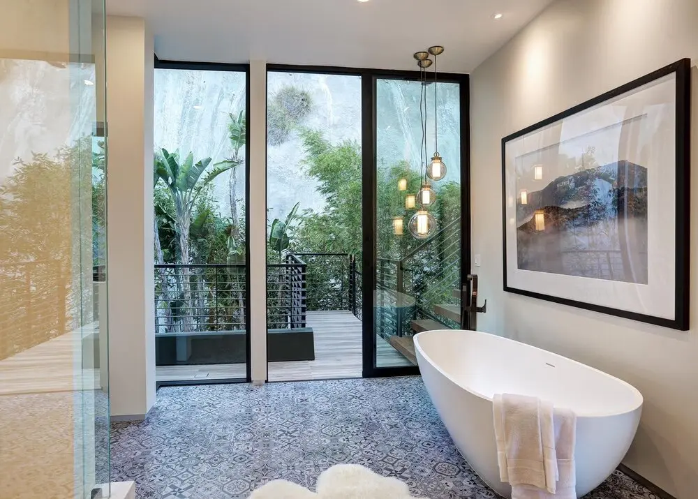 Bathroom remodel in Los Angeles with a freestanding tub facing a private balcony