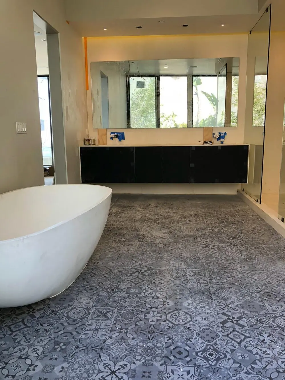 Bathroom remodel in Los Angeles in progress, with vanity installation underway