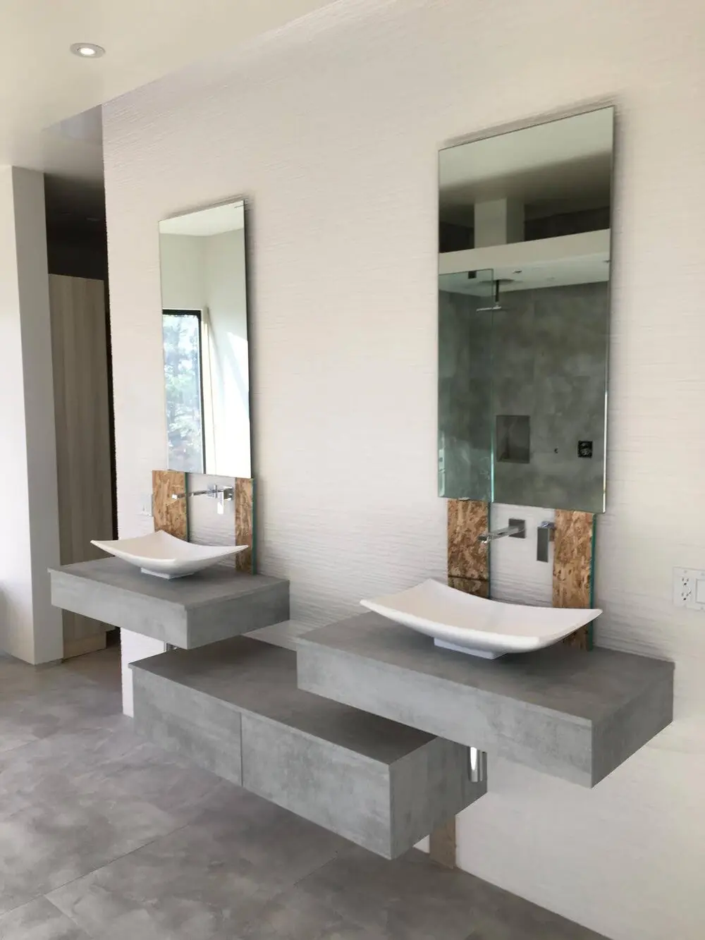 Bathroom with a floating double vanity in a Los Angeles full home renovation