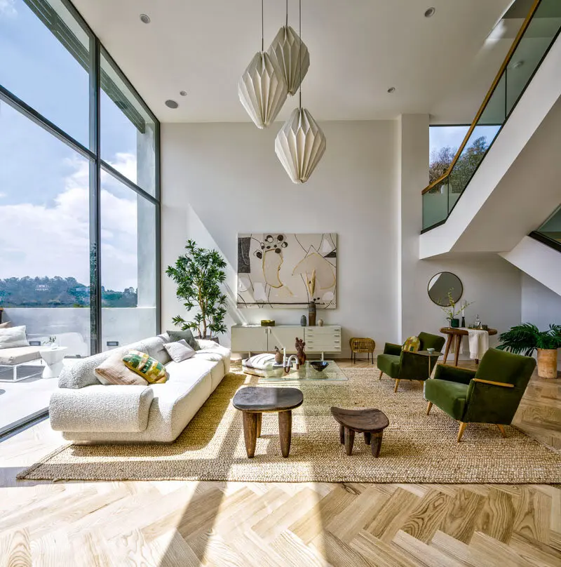 Living room with herringbone wood flooring in a Los Angeles full home renovation