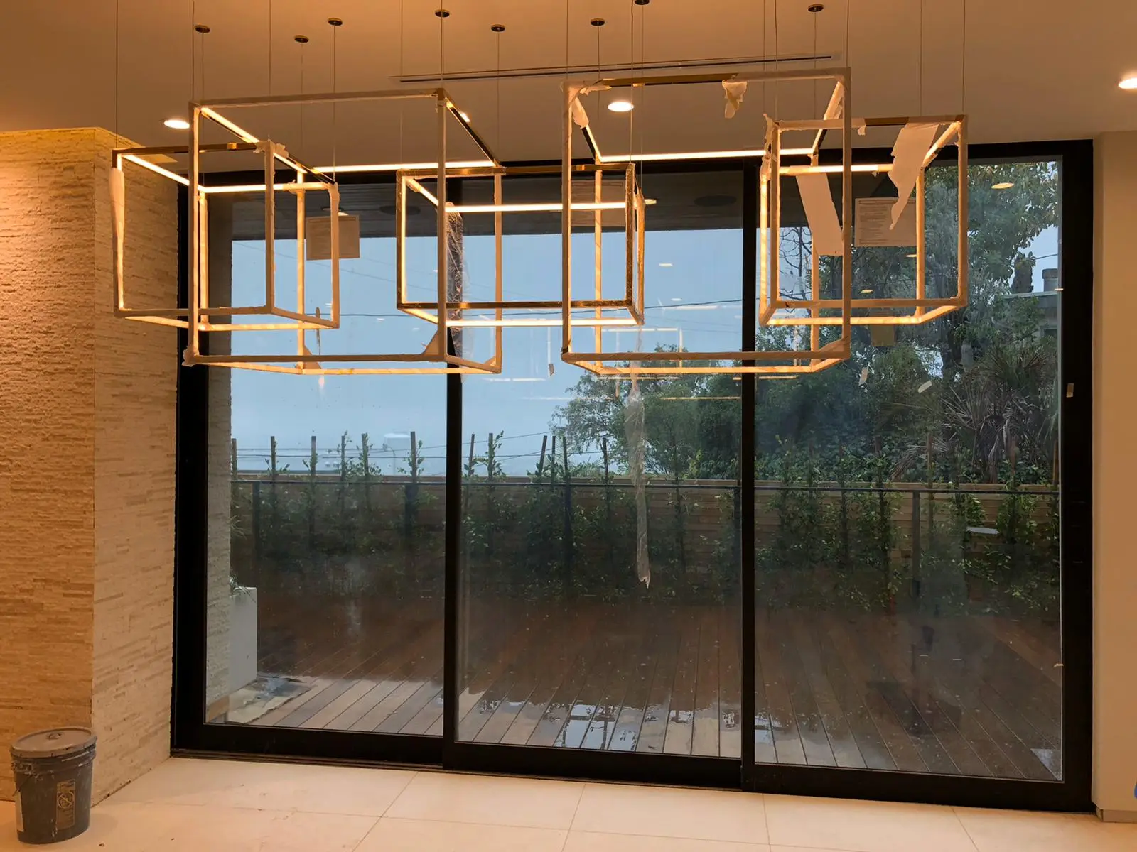 Custom lighting fixture installation in progress during a Los Angeles full home renovation