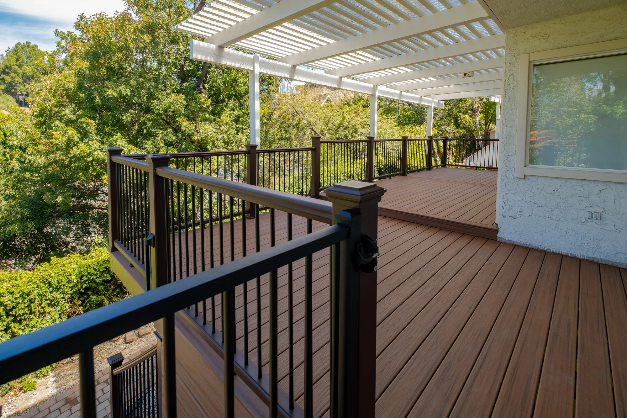 Black railing detail on a multi-level custom composite deck in Beverly Glen, Los Angeles