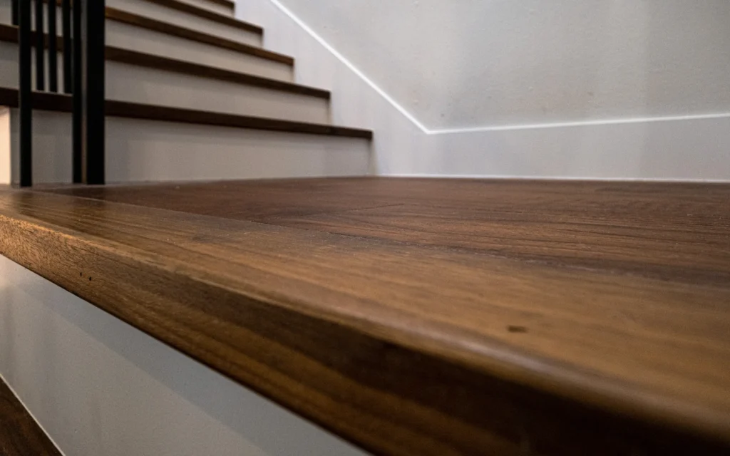 Custom walnut stair treads in a West LA full-home remodel