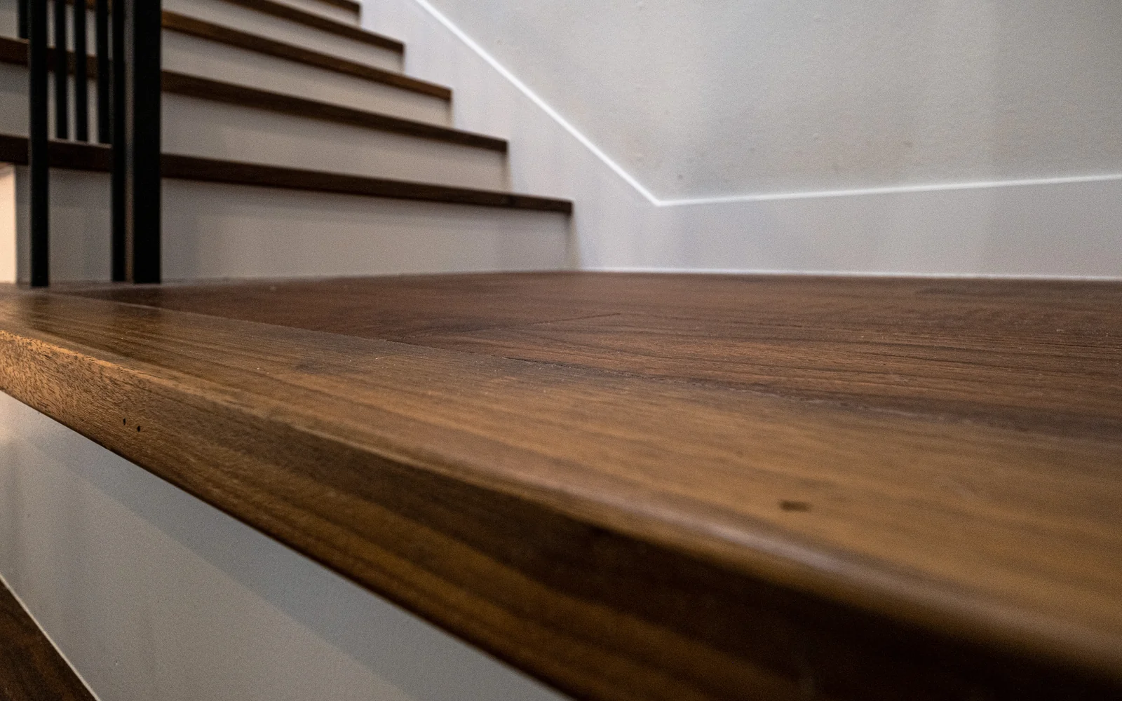 Custom walnut stair treads in a West LA full-home remodel