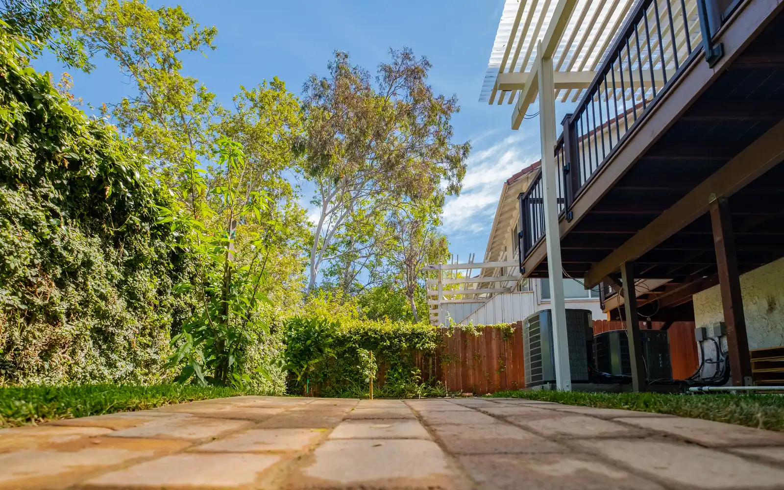 Large-format paver hardscape below a deck in Beverly Glen